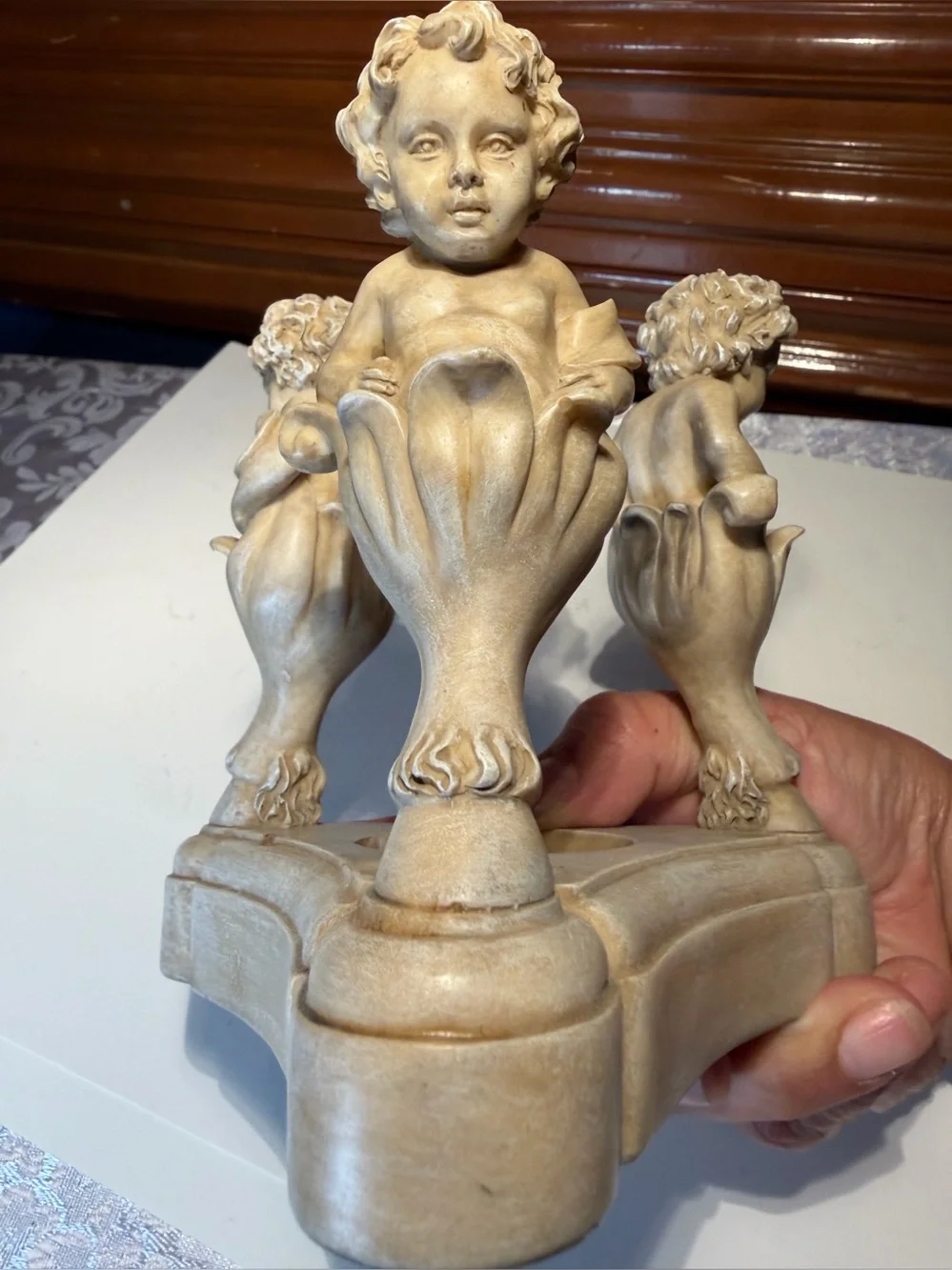 Vintage Resin Cherub Candle Holder features Three Cherubs Popping Out Of Flowers